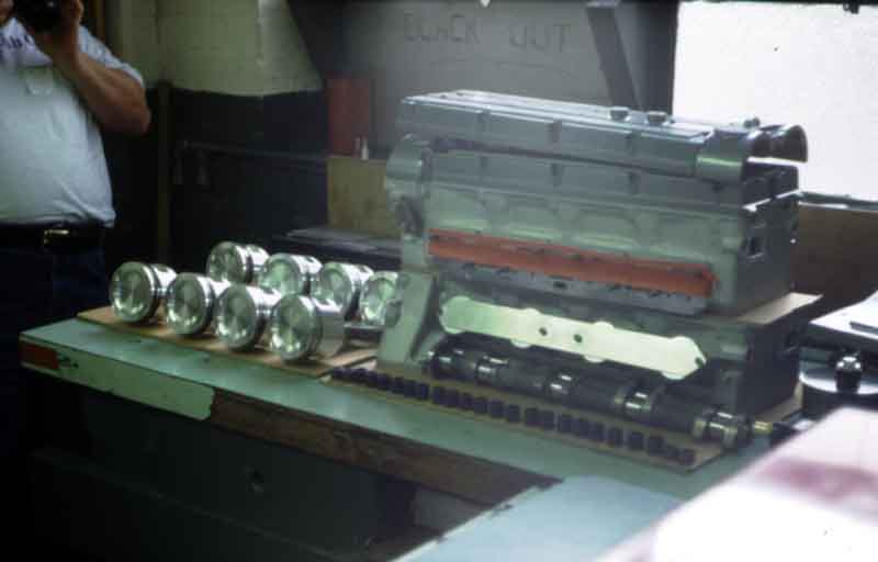 Engine parts selected and ready for assembly.